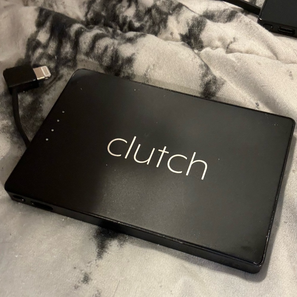 Clutch portable iPhone charger. Magnetizes to the back of your iPhone